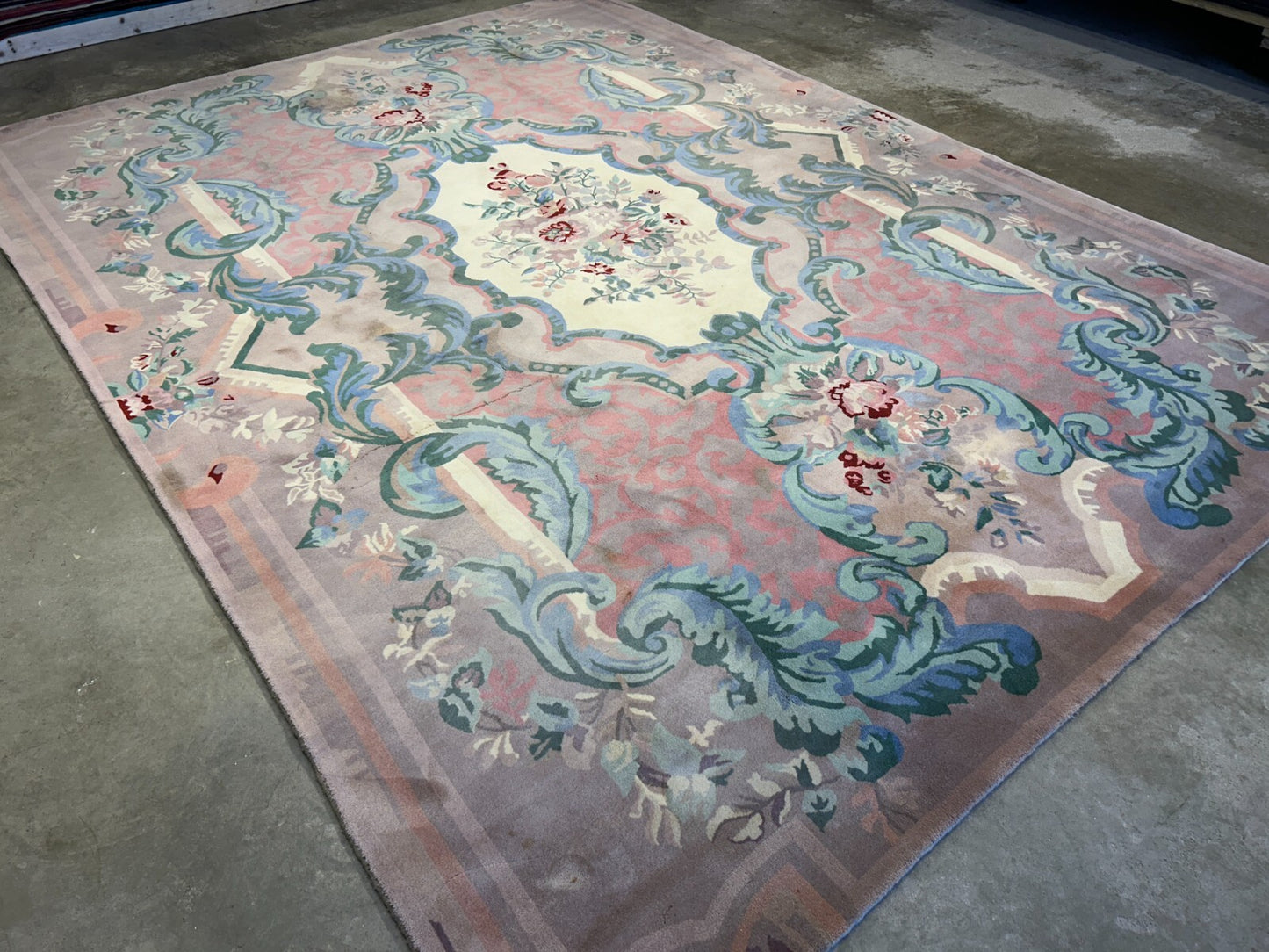 8'9"x11'10" Hand-Knotted 100% Wool Pile Oriental Rug  (Some stains on the Rug)