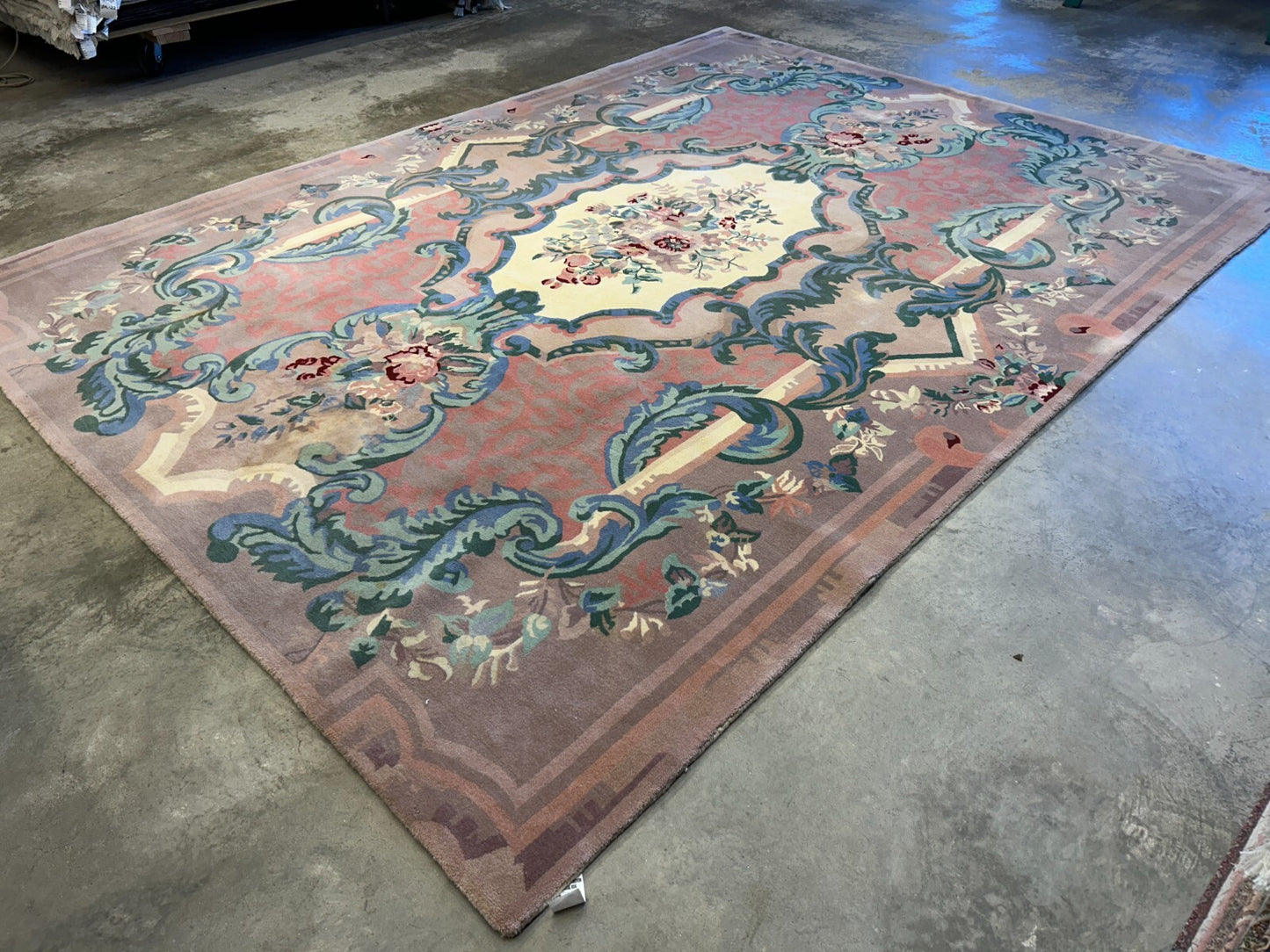 8'9"x11'10" Hand-Knotted 100% Wool Pile Oriental Rug  (Some stains on the Rug)