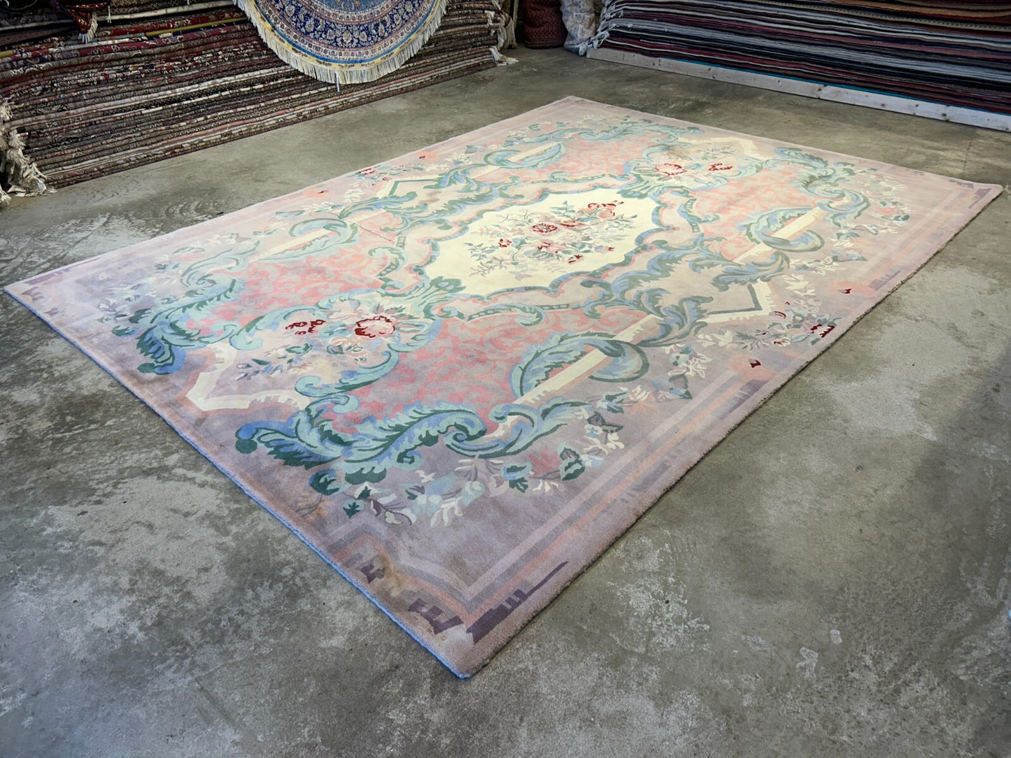 8'9"x11'10" Hand-Knotted 100% Wool Pile Oriental Rug  (Some stains on the Rug)